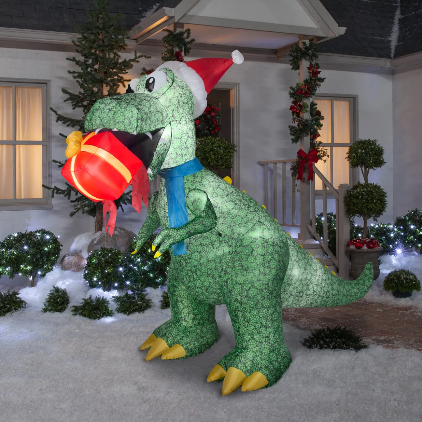 9.5 ft. Inflatable Tyrannosaurus Rex with Gift and LED Lights