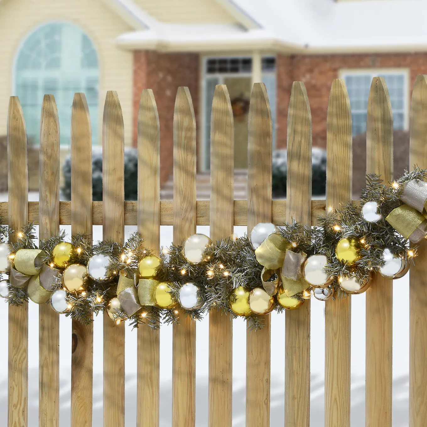 9 ft. Pre-Lit Gold Ornament Metallic Garland with Warm White LED Lights