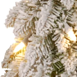 5 ft. Pre-Lit Snowy Downswept Forest Slim Tree with Clear Lights
