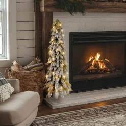 4 ft. Pre-Lit Snowy Downswept Forest Tree with Clear Lights