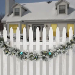 9 ft. Pre-Lit Snowy Tinkham Pine Garland with LED Lights