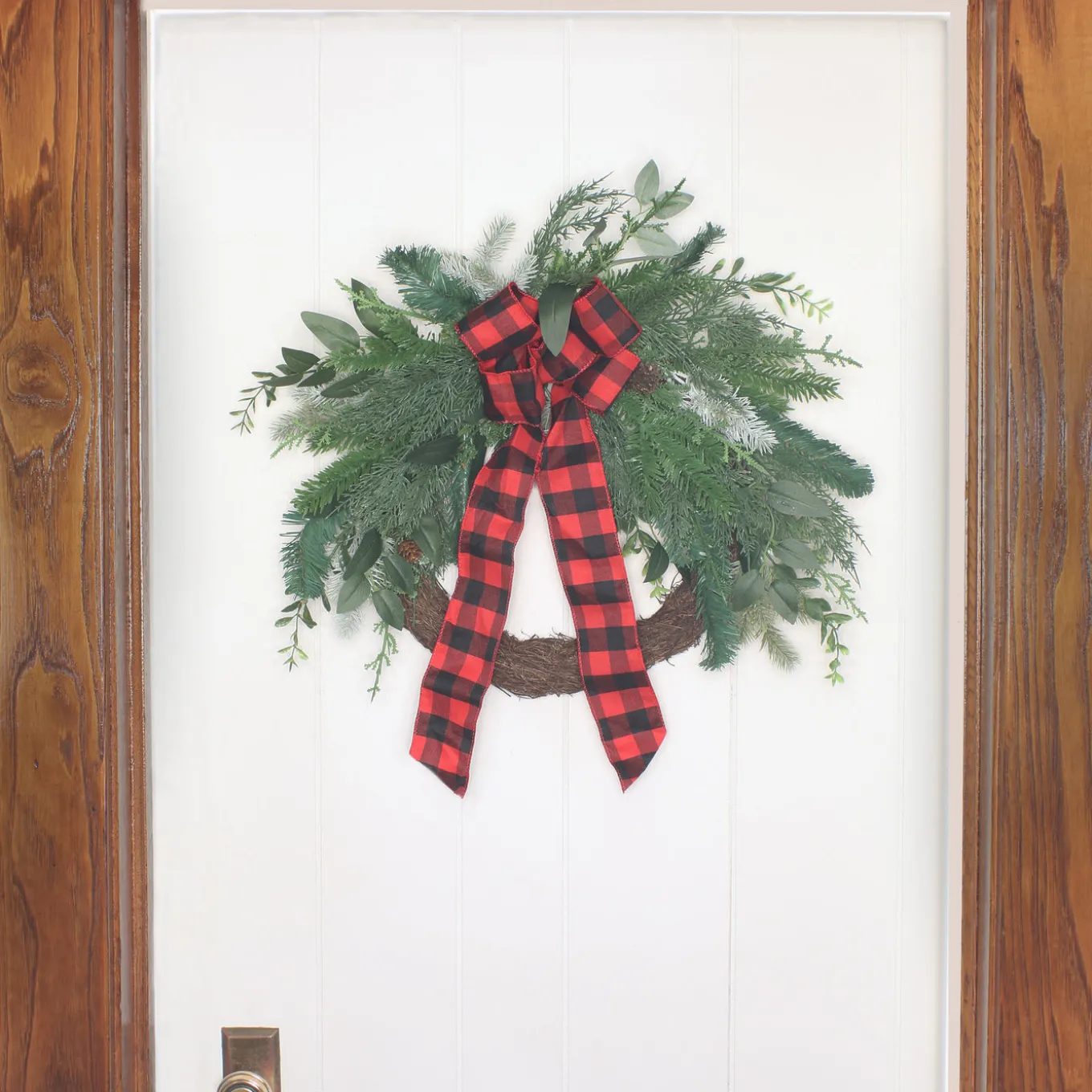 22 in. Mixed Pine and Bow Decorated Wreath