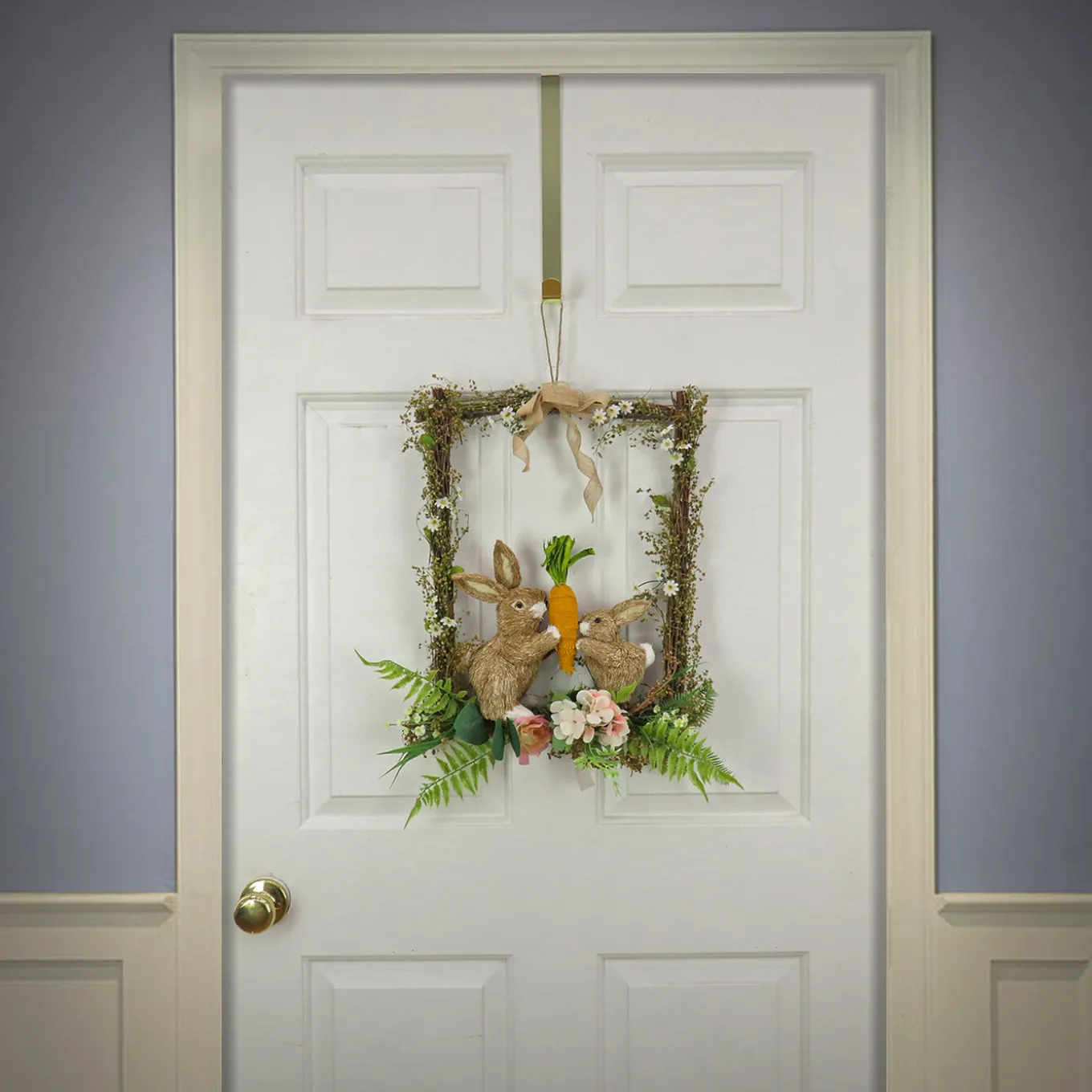 14 in. Easter Bunnies Hanging Wall Decoration Decorated with Two Bunnies, Carrots, Flower Blooms, Leafy Greens