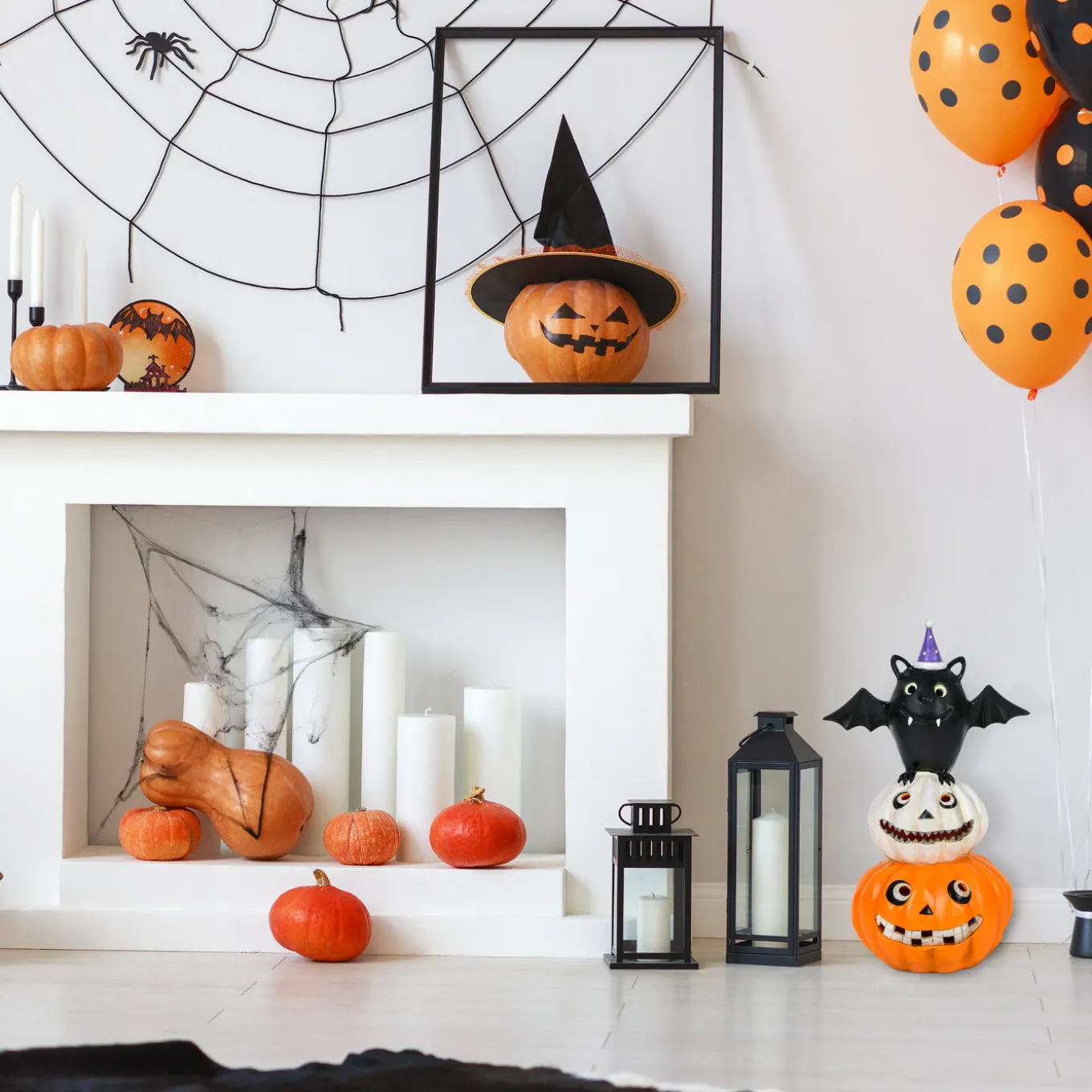 22 in. Halloween Pre-Lit Bat Standing on Pumpkins Tabletop Decoration with LED Lights