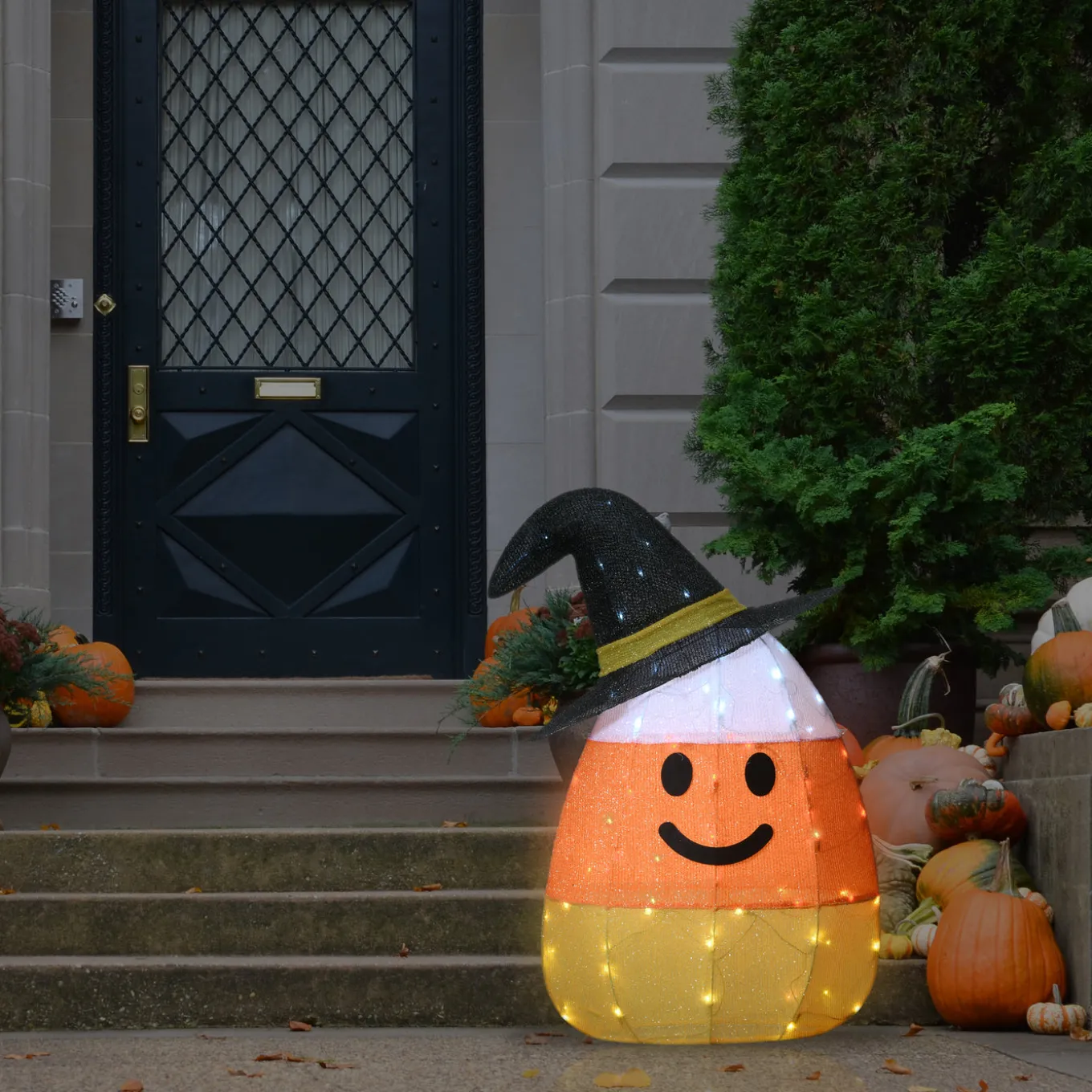 28 in. Halloween Pre-Lit Candy Corn Witch Outdoor Decoration with LED Lights