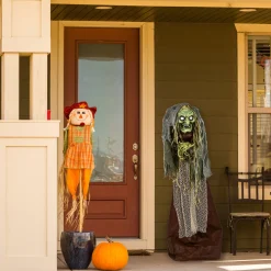 59 in. Halloween Pre-Lit Sound Activated Animated Scary Green Witch with LED Lights