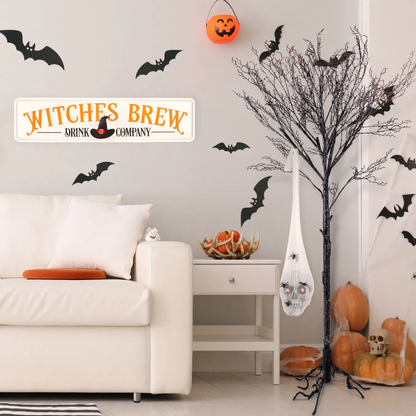 27 in. Halloween Pre-Lit Sound Activated Animated Hanging Skull with LED Lights