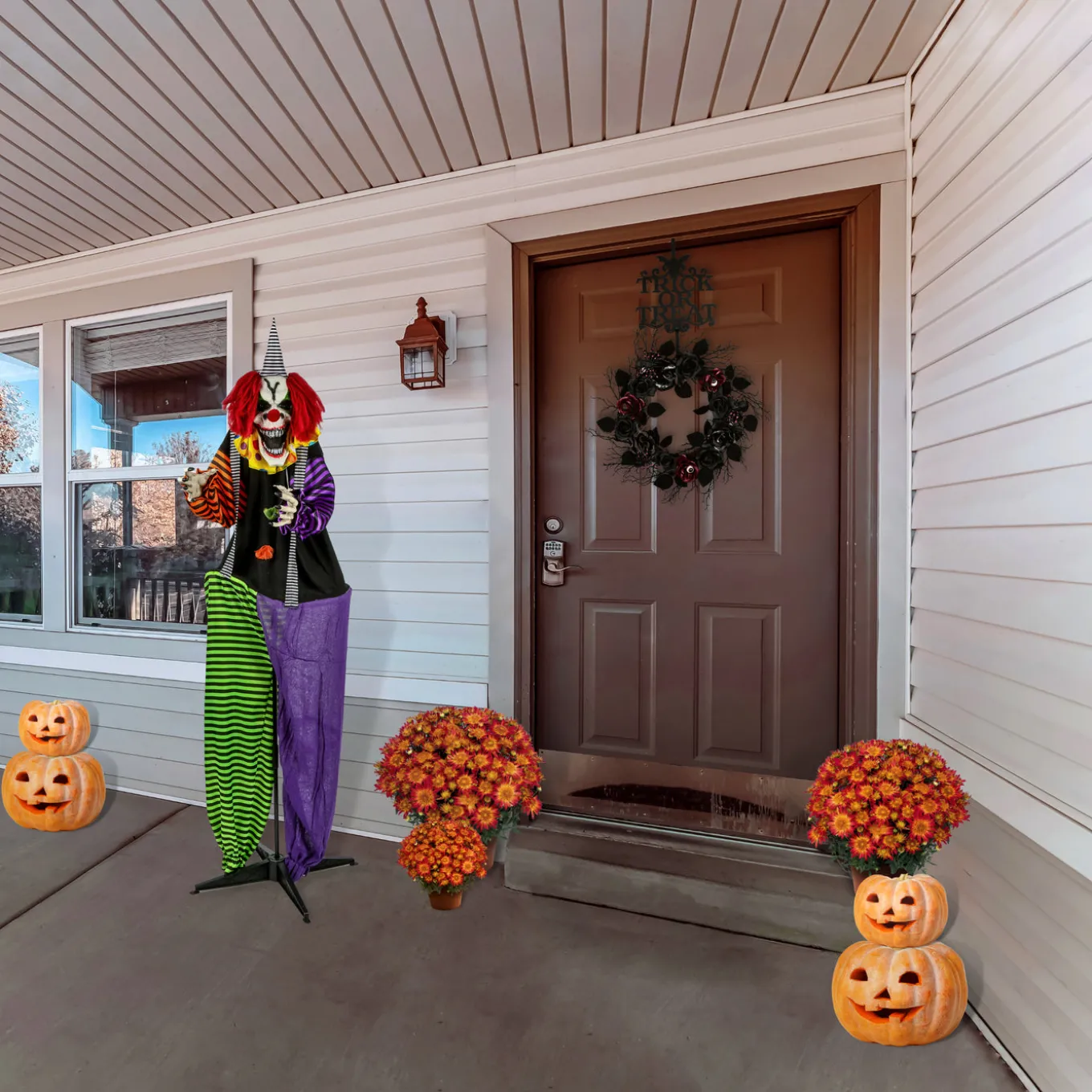 67 in. Halloween Pre-Lit Sound Activated Animated Spooky Clown with LED Lights