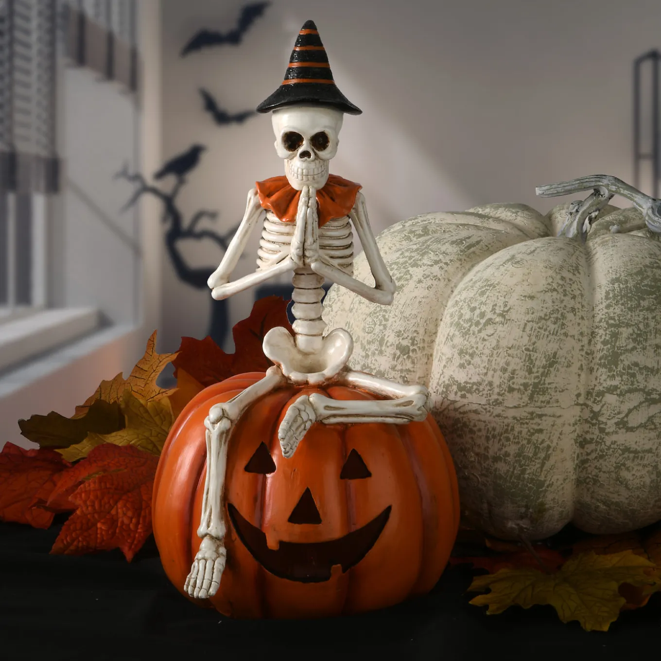 12 in. Halloween Trick or Treat Skeleton on Jack O Lantern with LED Lights