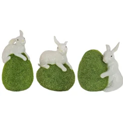 7 in. White Easter Rabbit Figures on Green Moss Covered Eggs, Set of 3