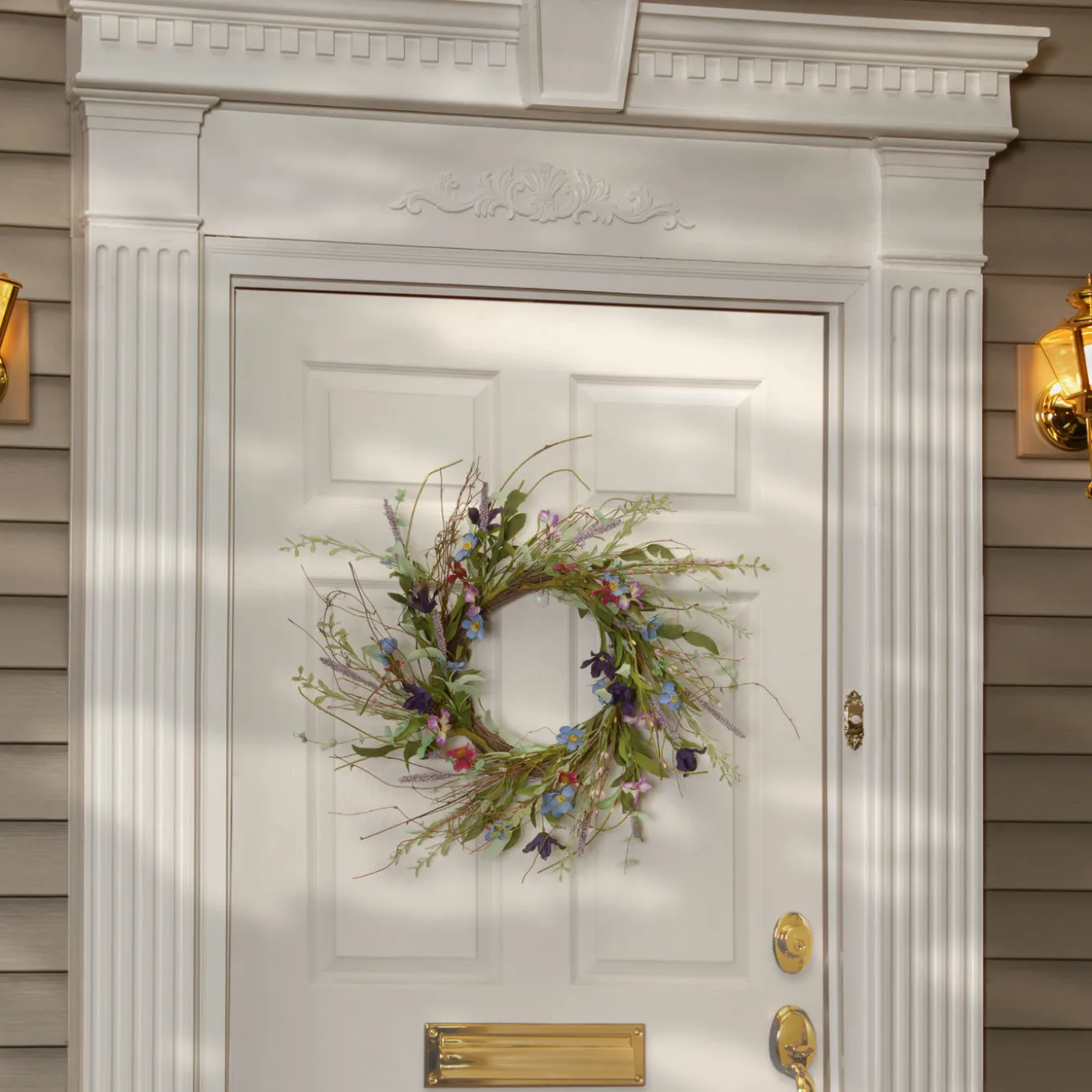 20in. Spring Wreath with Blue, Red and Pink Mixed Flower Blooms, Flowing Green Stems, Seed Pods